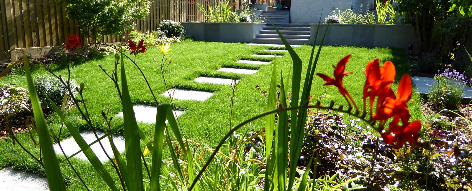 Planting throughout the garden is vibrant and colourful, with feature bed plants that attract bees, butterflies and other pollinators.