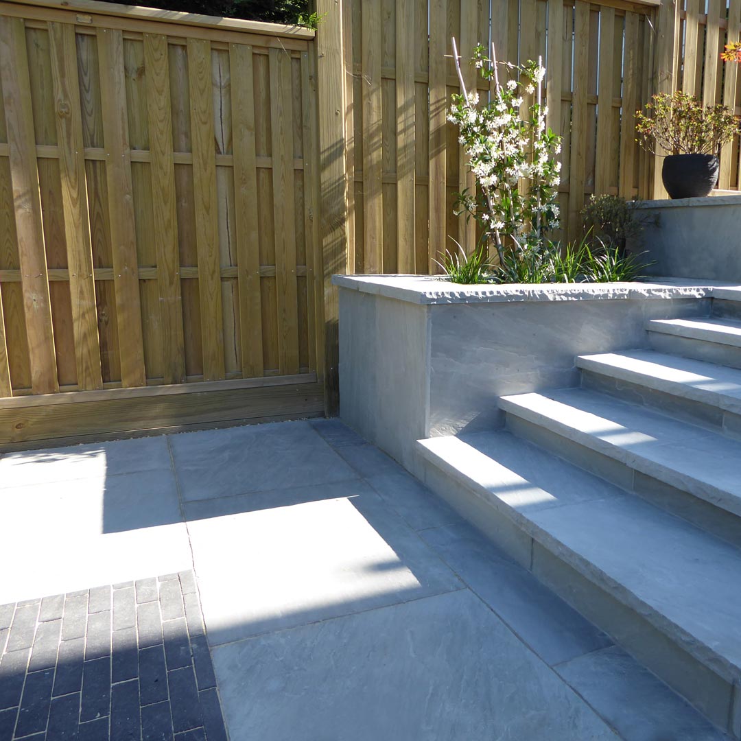 New fencing completes the renovation of the garden.