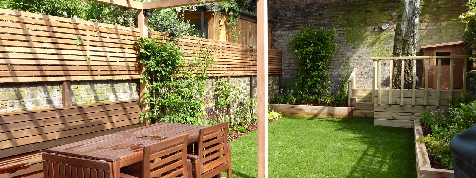 This Finsbury garden design in Islington, London N1, features a bespoke play den, pergola and seating area.