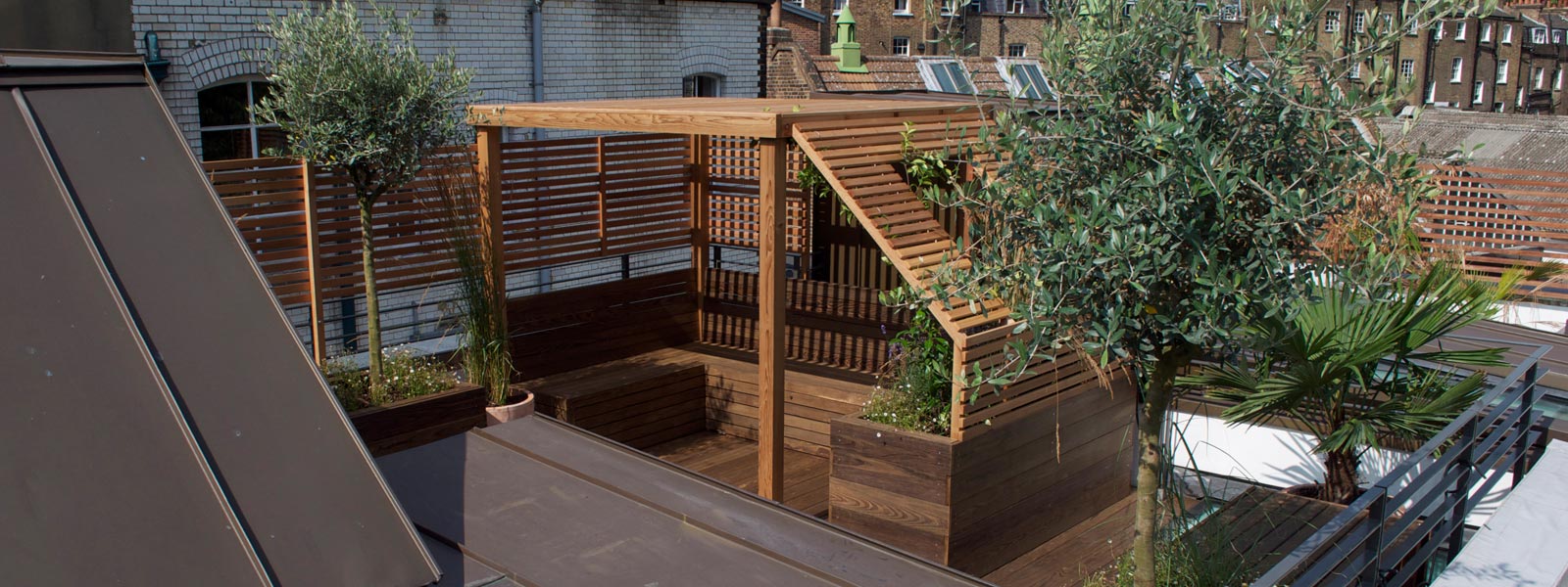 A contemporary roof terrace garden design in Bloomsbury, Central London WC1; a private oasis designed to complement the modern architecture.