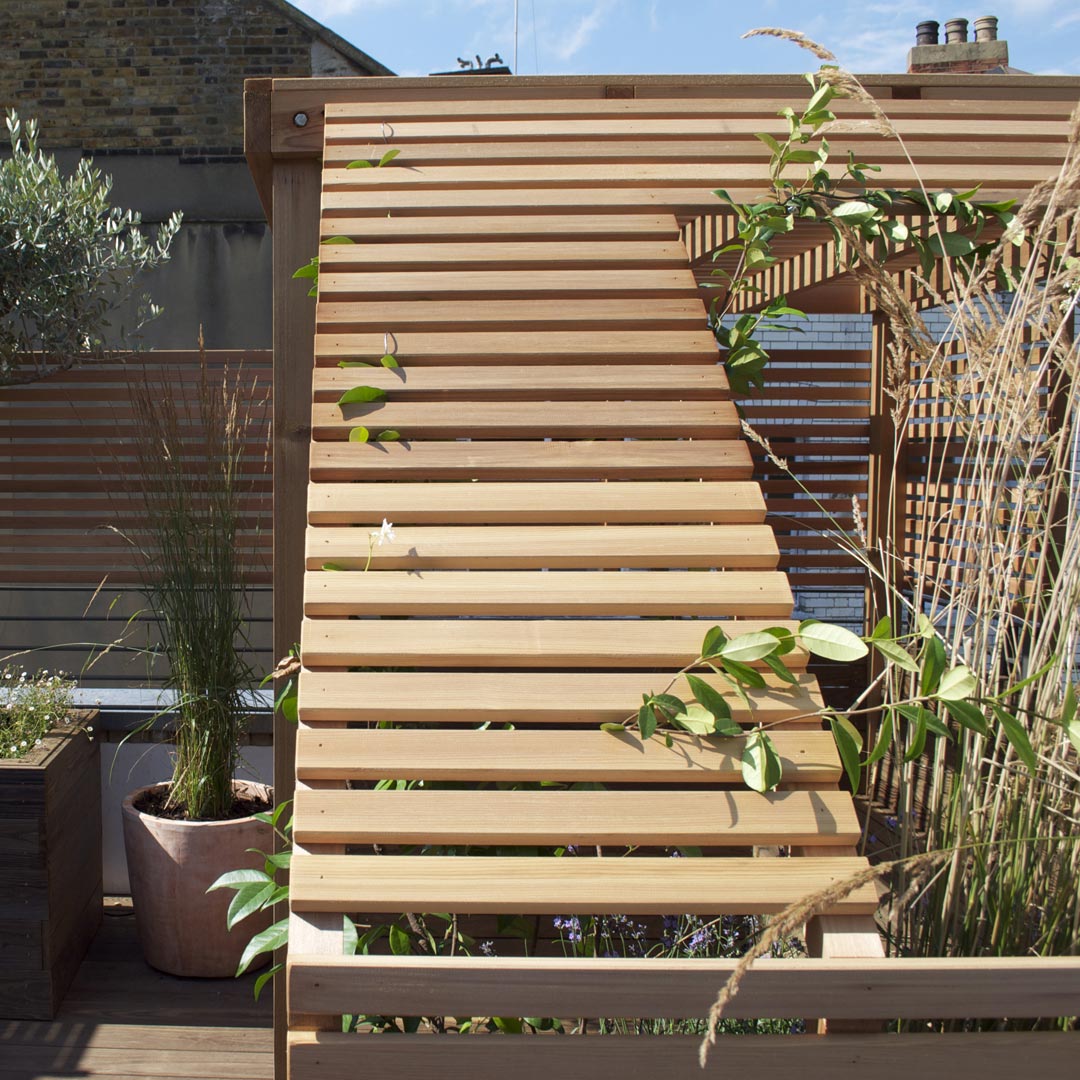 The angled sun-screen mimics the shape of the stairwell design.