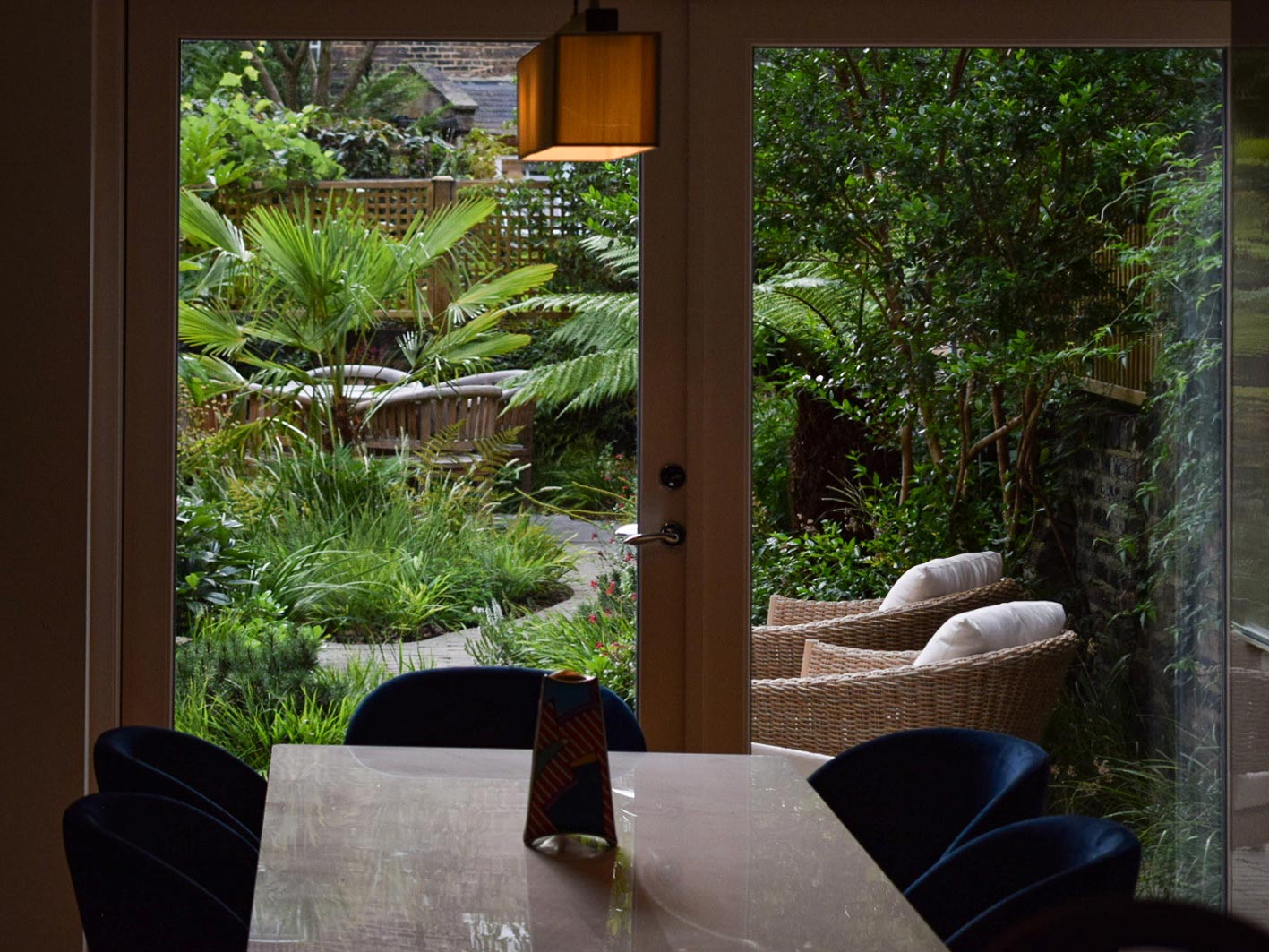 A room with a view looking out onto a tapestry of mixed herbaceous planting.