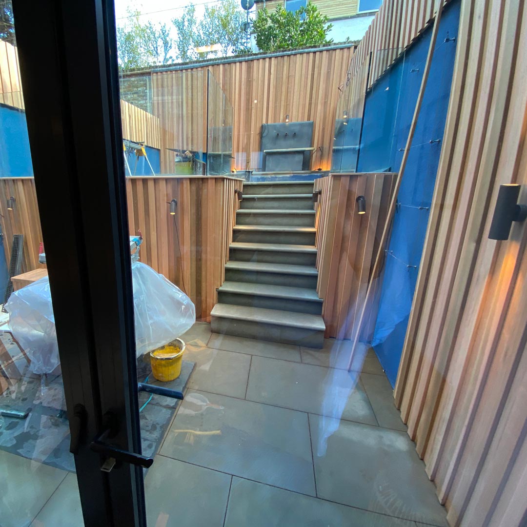 A garden makeover nearing its end. Waiting for the plants to arrive and the last finishing touches.